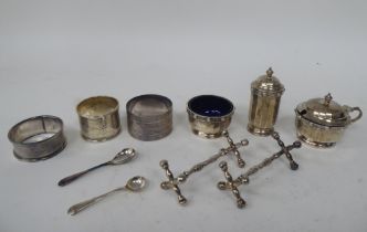 Silver collectables: to include a three piece condiments set with Celtic band ornament; and a pair