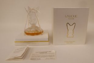 A Lalique opaque glass Les Fees Limited Edition 89/2006 perfume bottle  part full  5.25"h with a