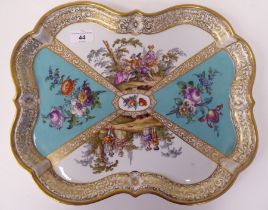 A Meissen 2nd Association porcelain serpentine outlined tray, decorated in alternate panels with