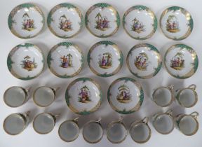 A set of twelve Augustus Rex porcelain coffee cups and saucers with entwined handles, decorated with