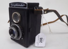 A vintage Voigtlander Brillant box camera with a folding viewfinder