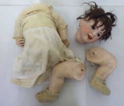 An early/mid 20thC SFBJ of Paris bisque head doll, model no.236, on a composition body and mobile
