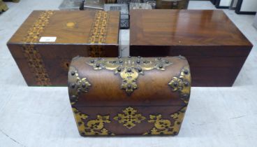 Three boxes: to include a late 19thC walnut casket with brass mounts  7"h  9"w