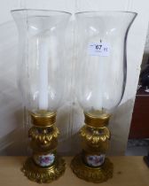 A pair of modern French inspired porcelain cast gilt brass and glazed candlesticks  13.5"h