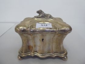 A late 19thC Continental white metal, lockable tea casket, the lid surmounted by a dog  5"h  6"w