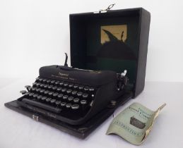 A vintage Imperial Model T portable manual typewriter