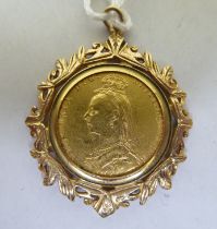 A Victorian sovereign, St George on the obverse  1888, in a 9ct gold mount