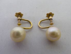 A pair of pearl set, 9ct gold screw-back earrings