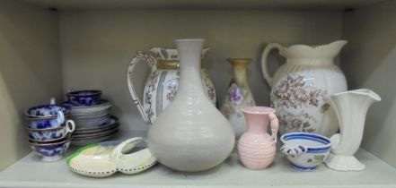 Decorative ceramics: to include a 19thC Ridgeways Cherry jug  10.5"h; and an Oxford Ware vase,