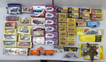 Diecast model vehicles with examples by Oxford and Dinky Toys