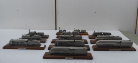 Diecast models of various locomotives and tenders