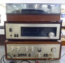 A Thorens turntable  5"h; a Luxman 500 AM-FM tuner  6.5"h; and a Luxman 503 Solid State integrated