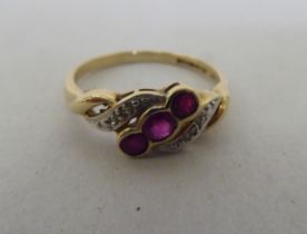A 9ct gold, ruby and diamond ring