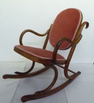 A child's early 20thC stained beech framed bentwood style rocking chair