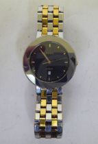 A Rado Diastar gold plated and stainless steel cased and strapped wristwatch, faced by a baton