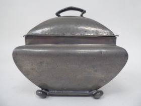 An English Pewter caddy of square outline with a bulbous body, cover and top handle, on bun feet