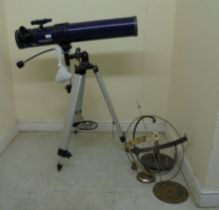 A Quasar by Meade telescope, on a tripod base  40"h; and a brass garden sphere ornament  20"h