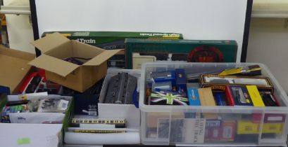 A collection of 00 gauge model locomotives, carriages, tenders and track accessories; and other