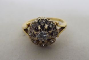 A two tier diamond cluster ring  (broken shank stamped 18ct)