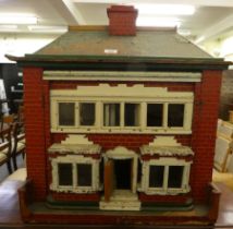 A scratch built dolls house with a removeable front panel and divided interior  28"h  25"w