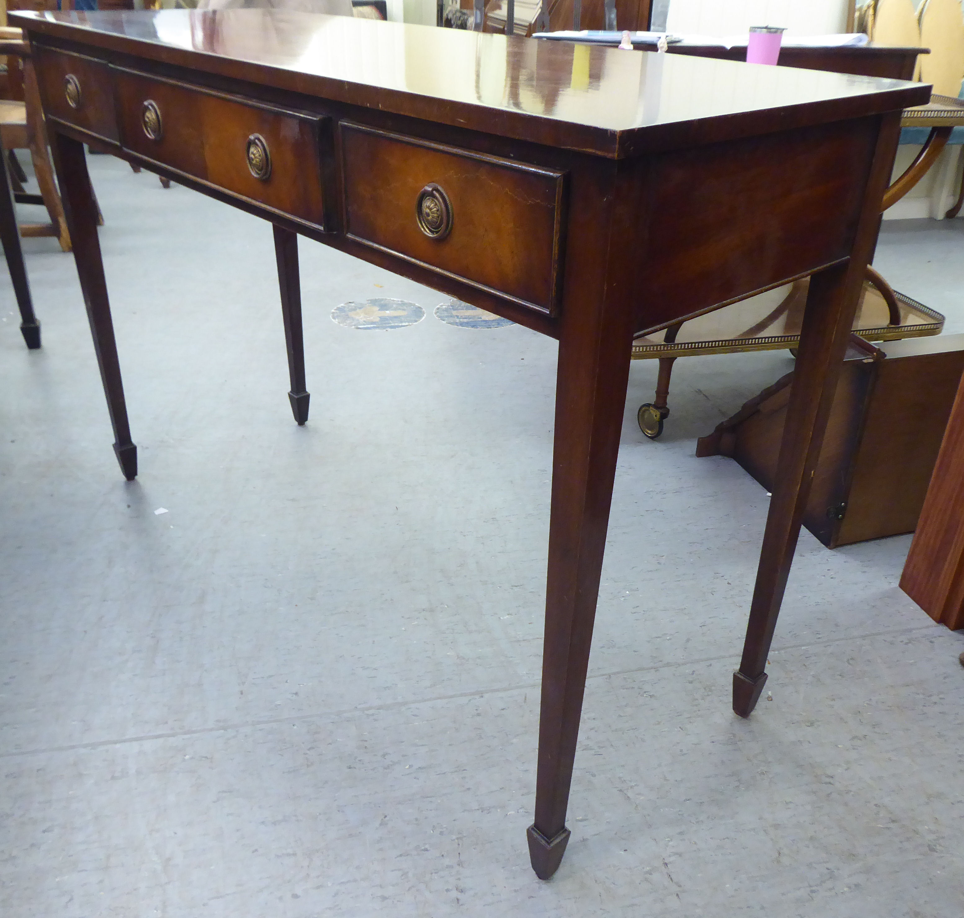 A modern mahogany finished three drawer serving table with cock beading and brass ring handles, - Image 5 of 5