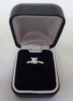 An 18ct white gold diamond solitaire ring