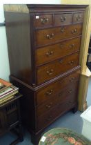 A 19thC mahogany chest-on-chest with a moulded cornice, over an arrangement of three short/six