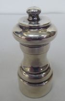 A silver pepper mill of traditional design  London marks rubbed