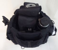 A Nikon D2X digital camera; a Nikkor ED 400mm 1:56 lens; and a Metz 45cl flash