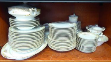 A Noritake porcelain dinner service, decorated with bouquets