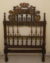 A late 19thC Anglo-Indian carved hardwood and overlaid metal, single bedhead  41"w