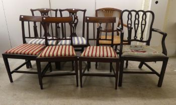 Seven 19thC mahogany dining chairs: to include a pair with yoke rails and pierced splats, raised