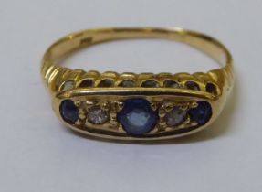 A late Victorian 18ct gold sapphire and diamond ring