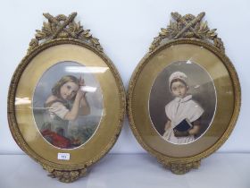 A pair of late 19thC head and shoulders portraits of girls  coloured prints  11" x 9" oval  framed