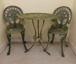 A modern painted alloy terrace table  29"h  27"dia; and a pair of matching chairs