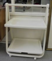 A modern Simo white plastic folding, two tier serving trolley, on casters  22"w