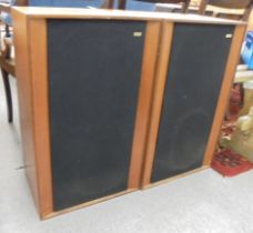 A pair of KEF teak cased, floorstanding speakers  27"h  17"w