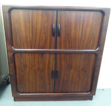 A mid 20thC, possibly Dyrlund, rosewood finished media cabinet, comprising an arrangement of