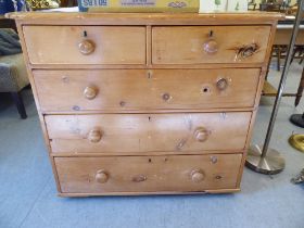 A late Victorian pine five drawer dressing chest, on a plinth  13"h  37"w