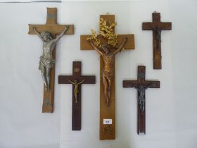 Five crucifixes, various designs and materials  largest 22.5"h