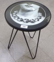 A table stool from The Fornasetti Collection from a design by Piero Fornasetti  18"h