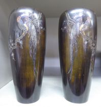 A pair of early 20thC Japanese bronze vases of slender baluster form, decorated and inlaid with