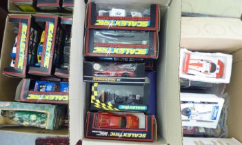 A collection of Scalextric electric model vehicles: to include F1 and Rally examples  mianly boxed