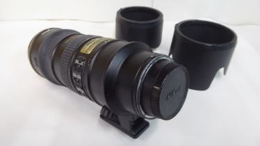 A Nikon ED AF-SUR 70-200mm camera lens