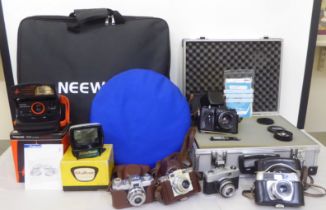 Photographic equipment and accessories: to include a Zenith TTL camera, in a fitted hard case