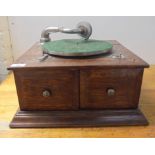 An early 20thC oak table top gramophone
