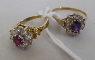 Two 9ct gold rings, one set with a ruby, surrounded by white stones; the other set with a purple