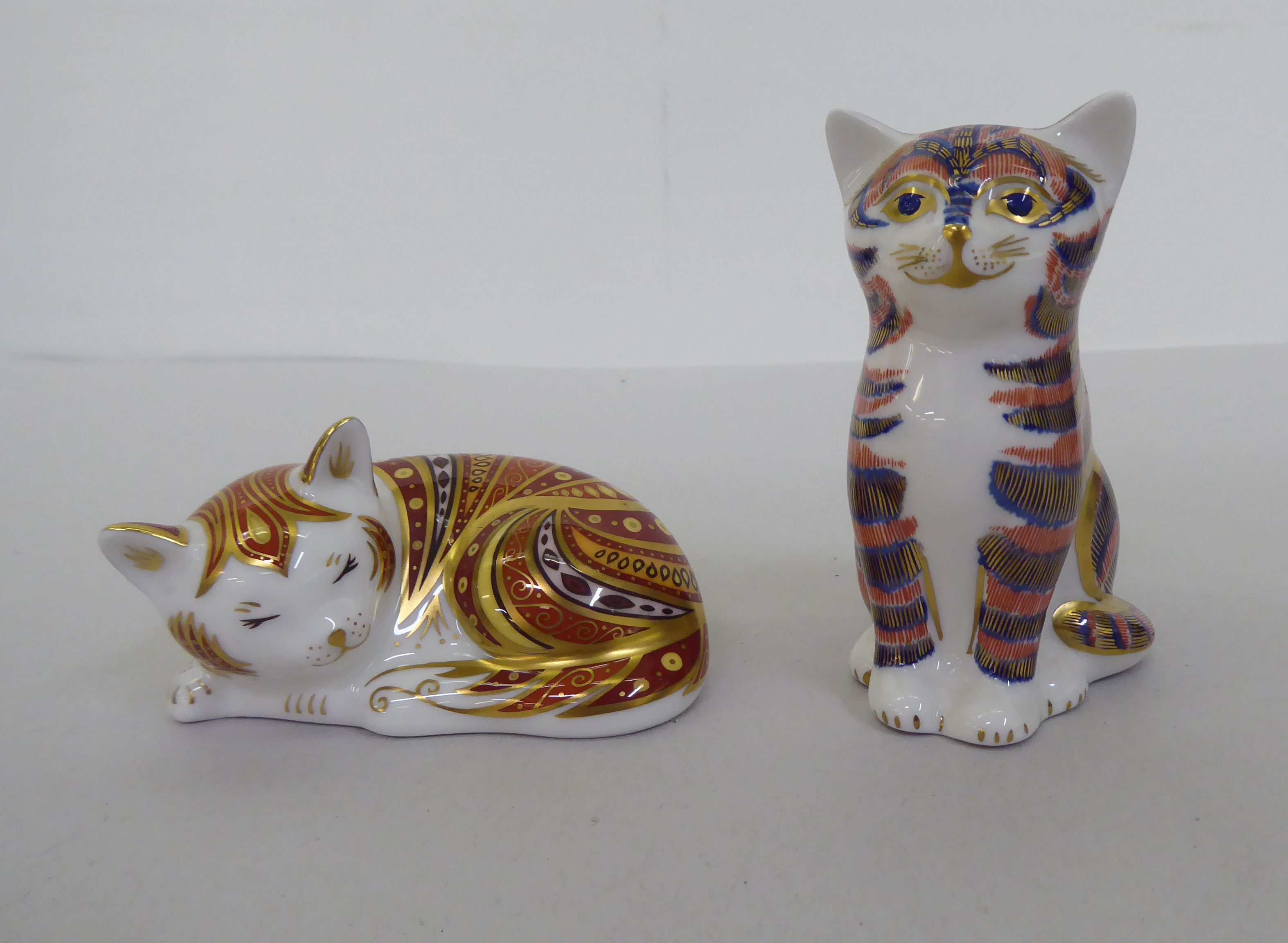 One Royal Worcester and six Royal Crown Derby china model cats, one with a silver stopper, the other - Image 11 of 13