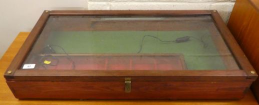 A modern retailers/collectors stained pine and partially glazed display case  5"h  32"w  17"deep