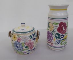 Two 1950s/60s Poole pottery items, viz. a vase  10"h; and a biscuit barrel and cover
